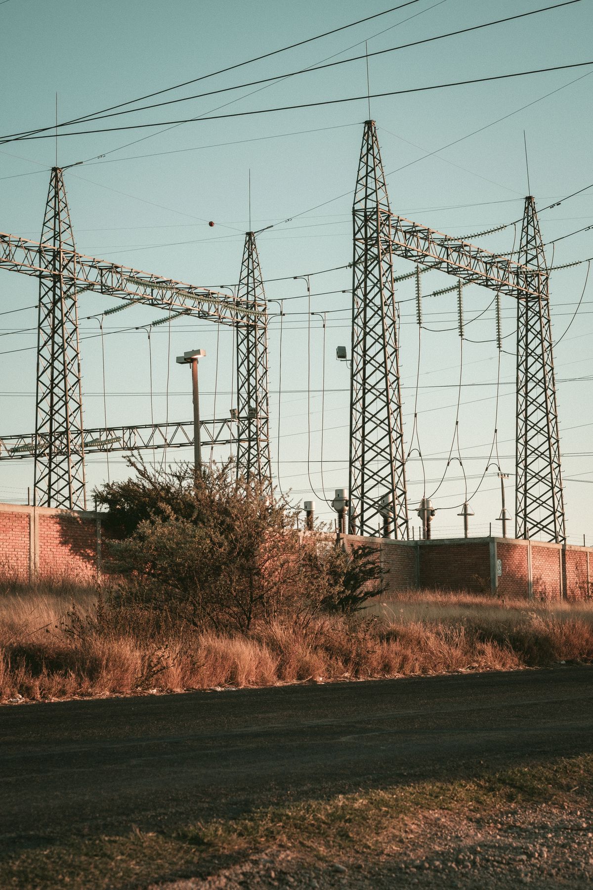 Terminal towers dead-ending conductors into a substation
